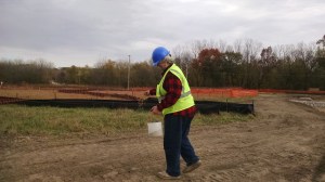 Planting the bioswale with a seed and sand mixture.